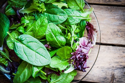 fresh green salad with spinach arugula romaine and lettuce