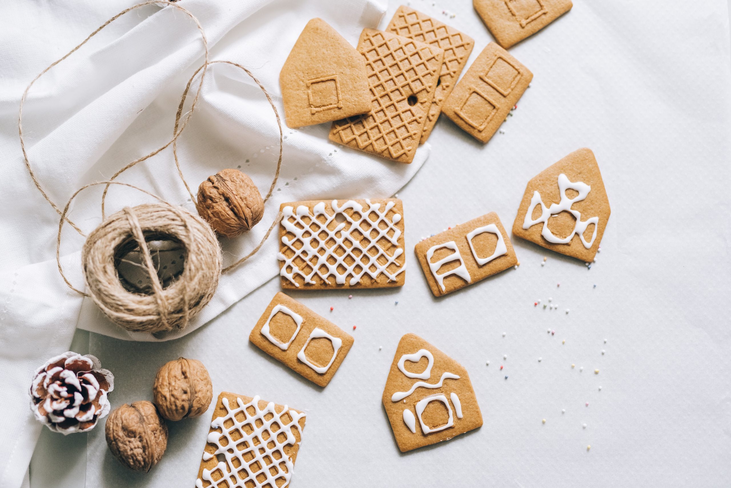 pieces of a gingerbread house laid out ready for building