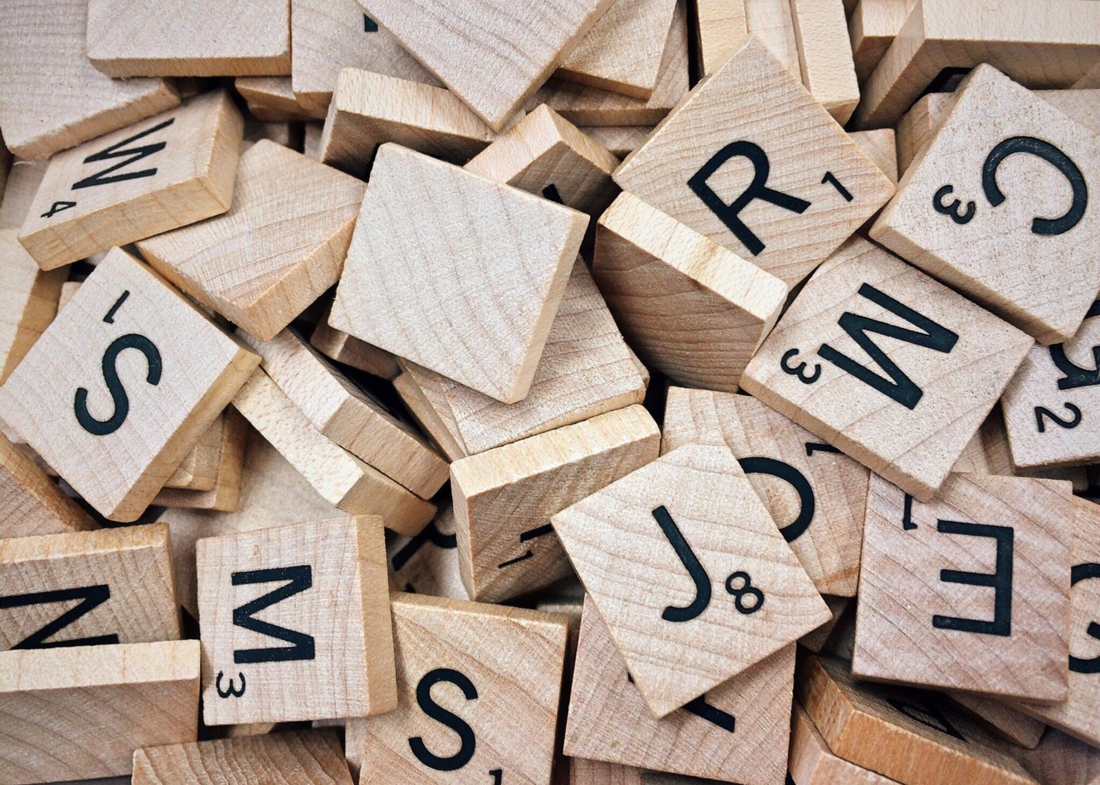 pile of wooden scrabble pieces